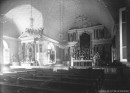 Pointe-aux-Trembles (Montréal) : l'église (Intérieur : vue d'ensemble de la voûte (1822), du choeur , de la chaire et d'un autel latéral) avant l'incendie de février 1937 / Edgar Gariépy . - [ca 1925]